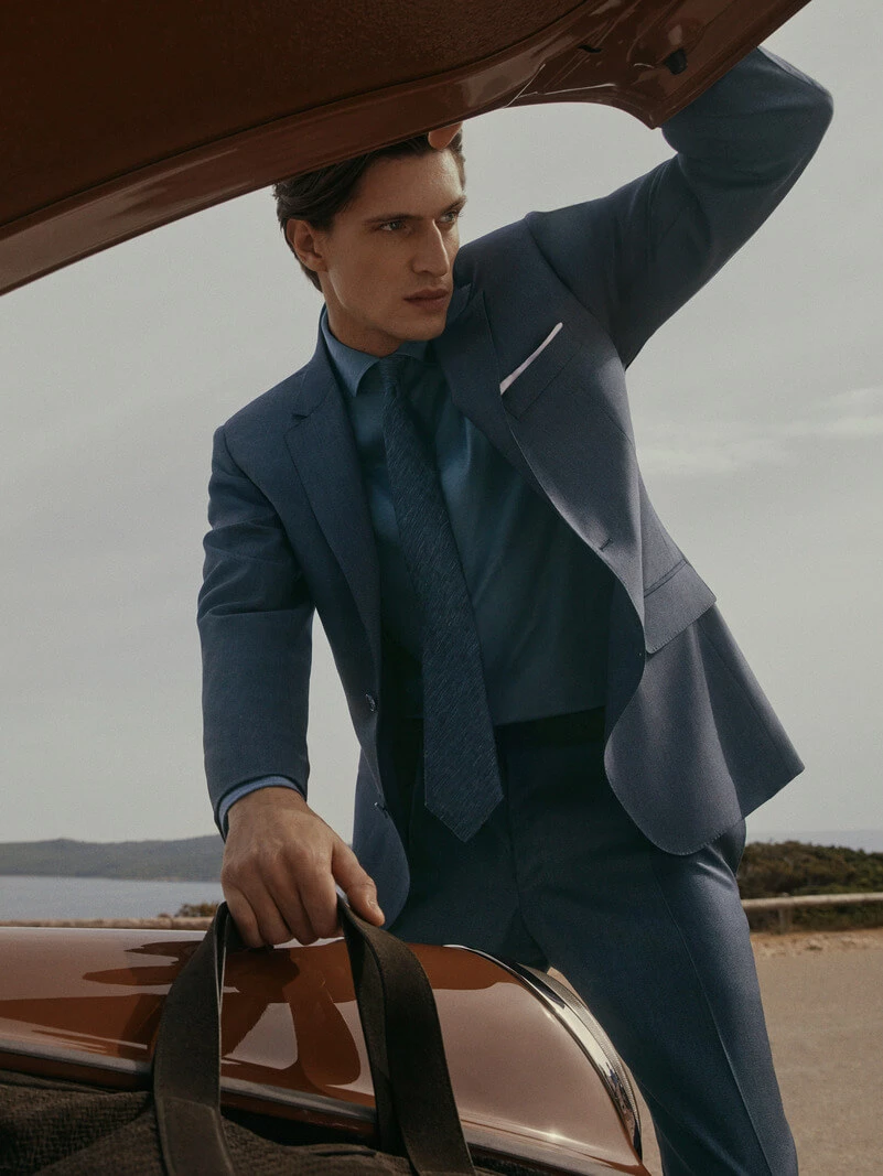 Well-dressed man representing the Kingsley Ess standard